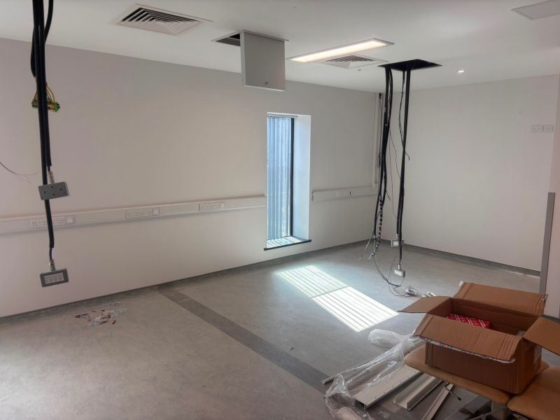 Clinical room with dado trunking fitted and ceiling service drops ready for connection